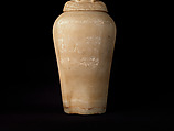 Canopic Jar (07.226.1) with a Lid Depicting a Queen (30.8.54), Travertine (Egyptian alabaster), blue glass, obsidian, unidentified stone