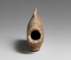 Ointment vase in the shape of a bolti fish, Travertine (Egyptian alabaster)