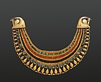 Broad collar of Senebtisi, Faience, gold, carnelian, turquoise.
Falcon heads and leaf pendants originally gilded plaster, restored in gilded silver. Eyes originally gilded beads restored in gilded plaster.