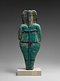 Nude female holding monkeys, Pale blue faience