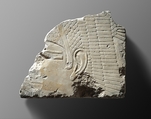 Relief fragment with the head of a goddess, Limestone, paint