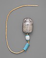 Scarab of the Storehouse Overseer Wah, Silver, electrum, glazed steatite, linen cord