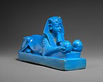 Sphinx of Amenhotep III, possibly from a Model of a Temple, Faience, remains of a travertine (Egyptian alabaster) tenon