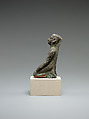 Kneeling priest, Bronze or cupreous alloy