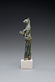 Bastet holding a lion-headed aegis, a sistrum (broken), and a basket, Bronze or copper alloy