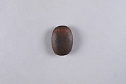 Oval plaque with hieroglyphs, Dark brown steatite
