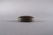 Oval plaque with hieroglyphs, Dark brown steatite