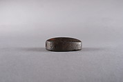 Oval plaque with hieroglyphs, Dark brown steatite