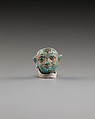 Head from female figurine, Green faience
