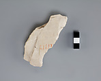 Hieratic ostracon with remains of red numeral, Limestone, ink, paint