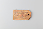 Mummy label of  Petemin, the son of Petempto, whose father was Petemin the Younger; his mother Thatre, Wood, ink