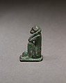 Monkey kneeling and resting its head in a hand, Bronze