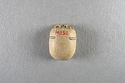 Scarab, Faience, traces of green glaze