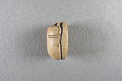 Scarab, Faience, traces of green glaze