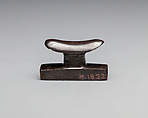 Headrest amulet, Hematite