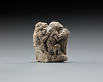 Monkey couple, the first playing a harp?, Limestone