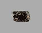 Polygonal cylinder seal; possibly reworked at a later date; possibly inscribed, Hematite