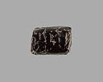 Polygonal cylinder seal; possibly reworked at a later date; possibly inscribed, Hematite