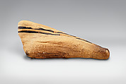 Sacred animal mummy of an ibis, Dyed and unyed linen, animal remains, mummfication materials