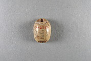 Scarab, Faience, traces of green glaze