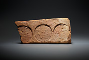 Brick Stamped with a Circular Seal, Pottery