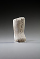 Lower part of a shabti, Limestone, paint