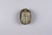 Scarab with Bes and prisoners, Glazed steatite