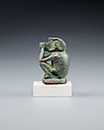 Figure of a squatting cynocephalus ape, Bronze or copper alloy
