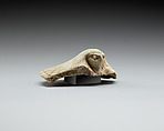 Lid fragment in form of a falcon's head, Faience