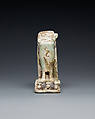 Lower half of a goddess on a throne with Bes figures, its base formed by prostrate captives, Faience