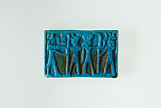 Spacer-bead with images of divinities and a king, Faience