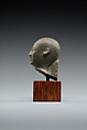 Head from the figure of an official, Fine-grained greenish-grey stone