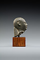 Head from the figure of an official, Fine-grained greenish-grey stone