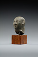 Head from the figure of an official, Fine-grained greenish-grey stone