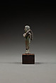 Statuette of a flutist, Copper alloy