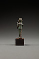 Statuette of a flutist, Copper alloy