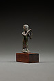 Statuette of a flutist, Copper alloy