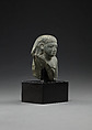 Upper part of a male seated figure, Fine-grained grey stone (graywacke?)