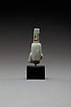 Upper part of a figure of Isis nursing Horus, Faience