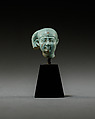 Head from a figure of a child god, perhaps Harpokrates, Faience