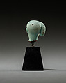 Head from a figure of a child god, perhaps Harpokrates, Faience