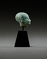 Head from a figure of a child god, perhaps Harpokrates, Faience