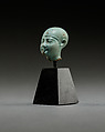 Head from a figure of a child god, perhaps Harpokrates, Faience