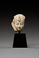 Head of a Harpokrates with a Blue Crown and Sidelock, Limestone