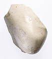 Elbow, with garment, Indurated limestone