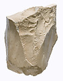 Knee with pleated garment, Indurated limestone