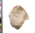 Right shoulder slice with shawl traces and Aten cartouche, Siliceous indurated limestone