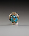 Figurine of head, Blue faience, pigment