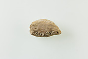 Fragment of clay lump with imbedded ring beads, Low-fired whitish clay, faience