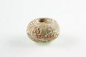 Bead with the name of Amenemhat II, Unglazed faience